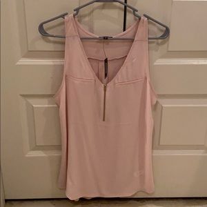 Light pink zip up tank.